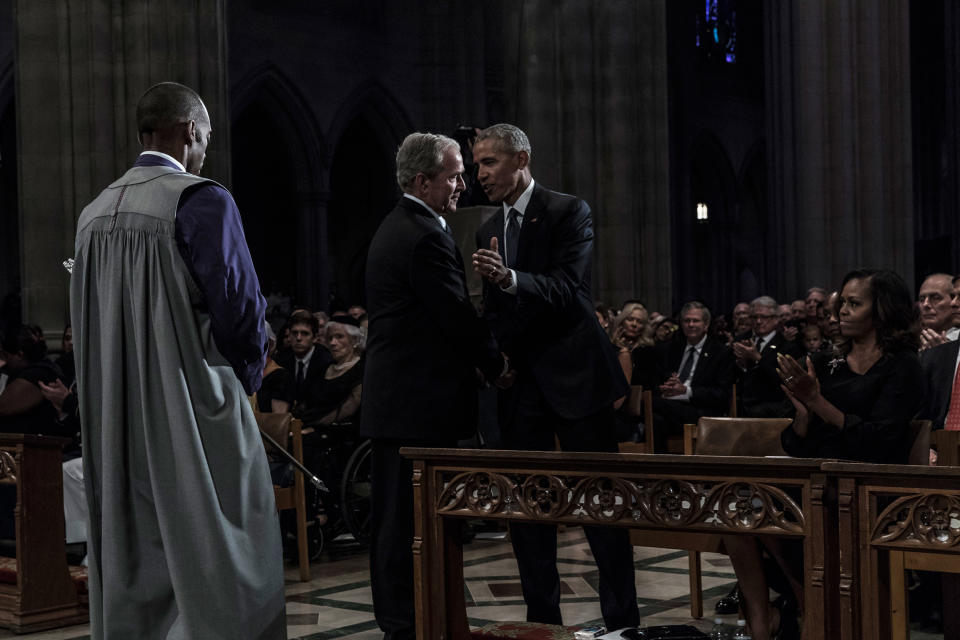 Former US Presidents Barack Obama, and George W. Bush during a memorial service for Senator John McCain at the Washington National Cathedral on September 1, 2018.