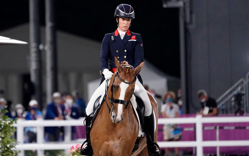 Britain's Charlotte Dujardin was banned for six months from competing by the FEI after a video emerged of her whipping a horse's legs