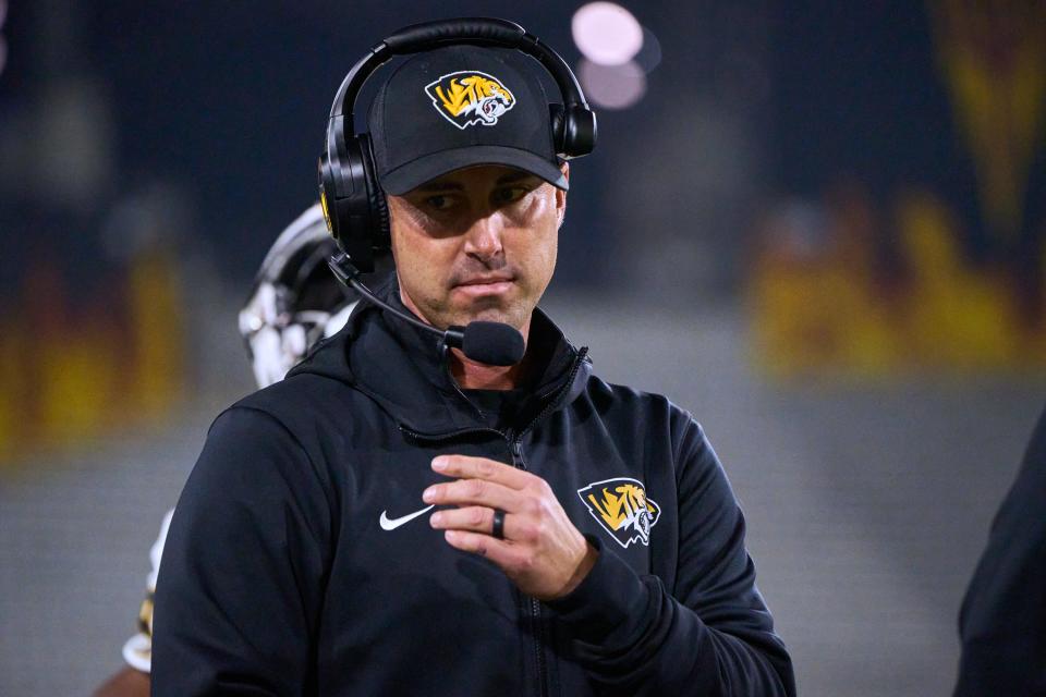 Saguaro Sabercats head coach Jason Mohns walks the sidelines during the Open Division state championship game at Sun Devil Stadium in Tempe on Saturday, Dec. 10, 2022.