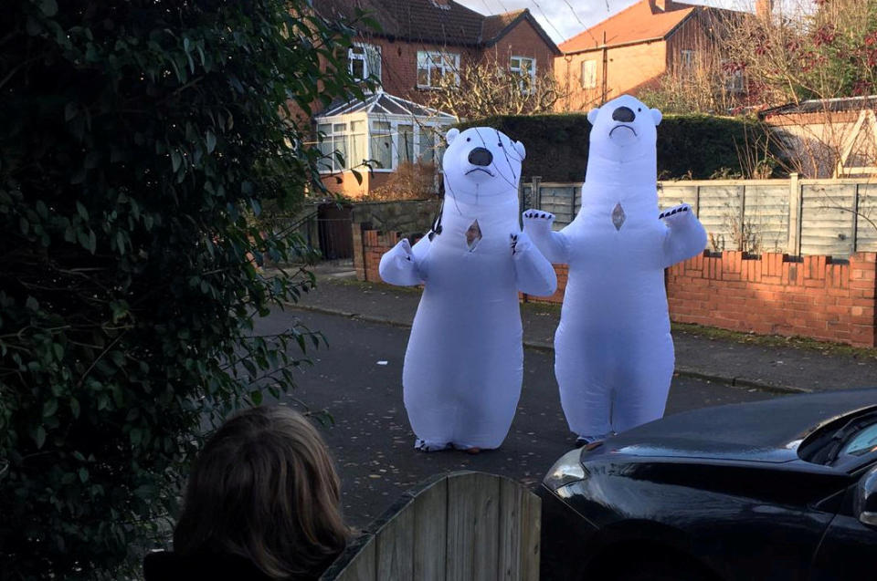 Grandparents Barbara, 71, and Clive Walshaw, 73, surprised their three grandsons by wearing a polar bear suit so they could hug for the first time since March. (Neil Walshaw/SWNS)