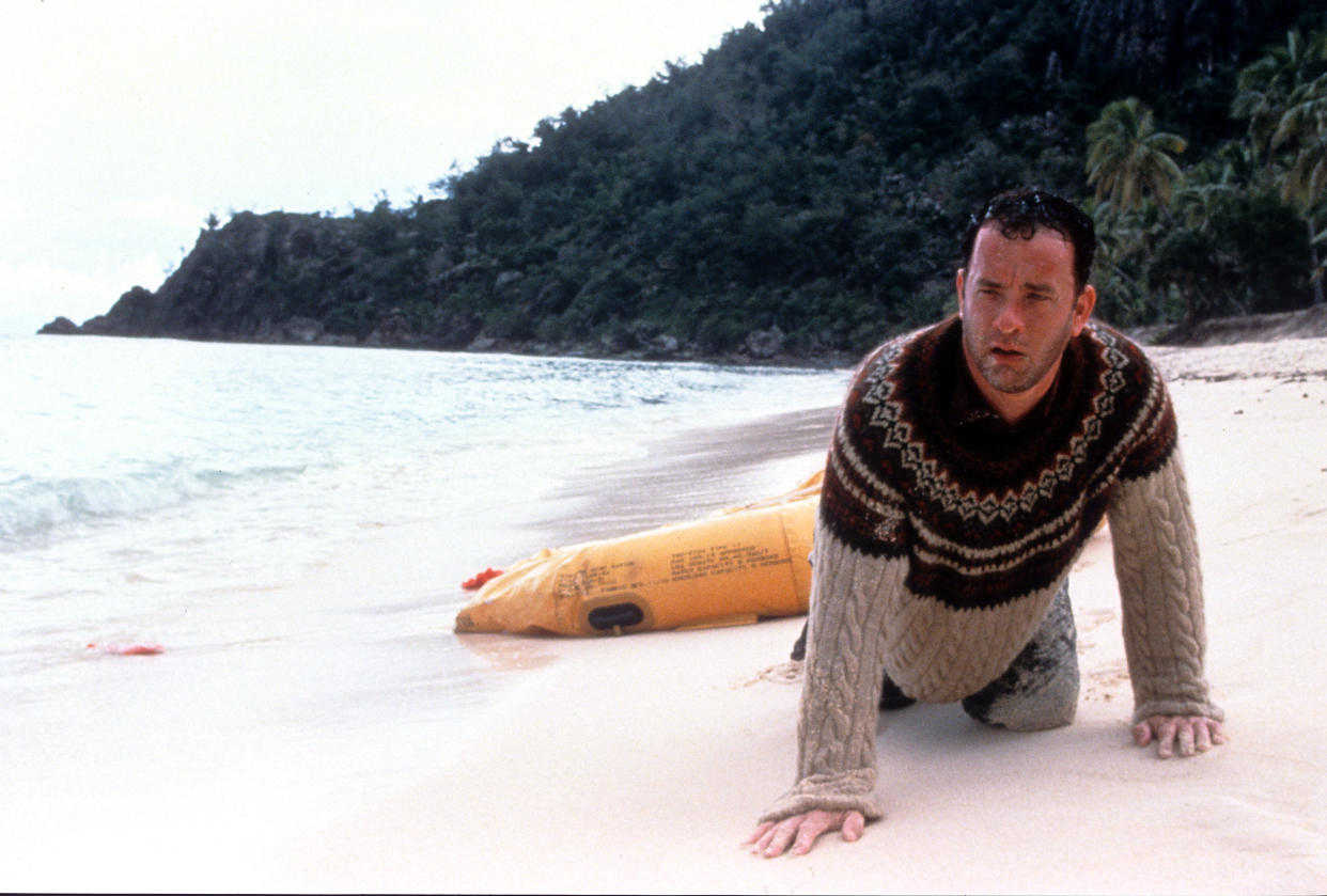 Tom Hanks washed up on the beach of an island in a scene from the film 'Cast Away', 2000. (Photo by 20th Century-Fox/Getty Images)