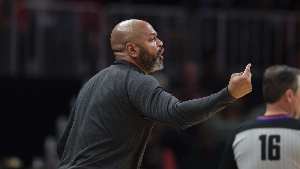 Cleveland Cavaliers coach J.B. Bickerstaff yells during the first half of the team's NBA basketball game against the Atlanta Hawks, Tuesday, March 28, 2023, in Atlanta. (AP Photo/Hakim Wright Sr.)