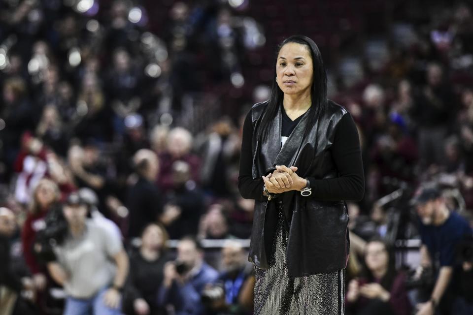 South Carolina head coach Dawn Staley stands on the court before an NCAA college basketball game Sunday, March 1, 2020, in Columbia, S.C. South Carolina defeated Texas A&M 60-52. (AP Photo/Sean Rayford)