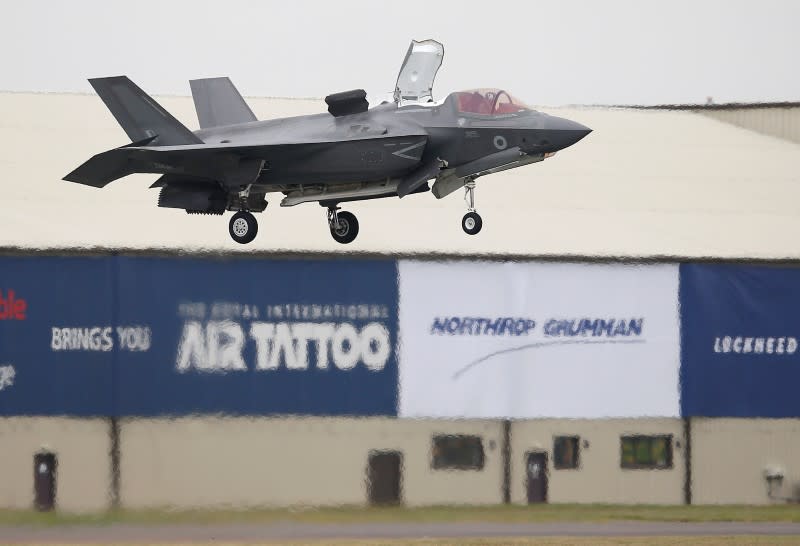 A RAF Lockheed Martin F-35B fighter jet hovers while landing during a flying display at the Royal International Air Tattoo at Fairford, Britain July 8, 2016. REUTERS/Peter Nicholls