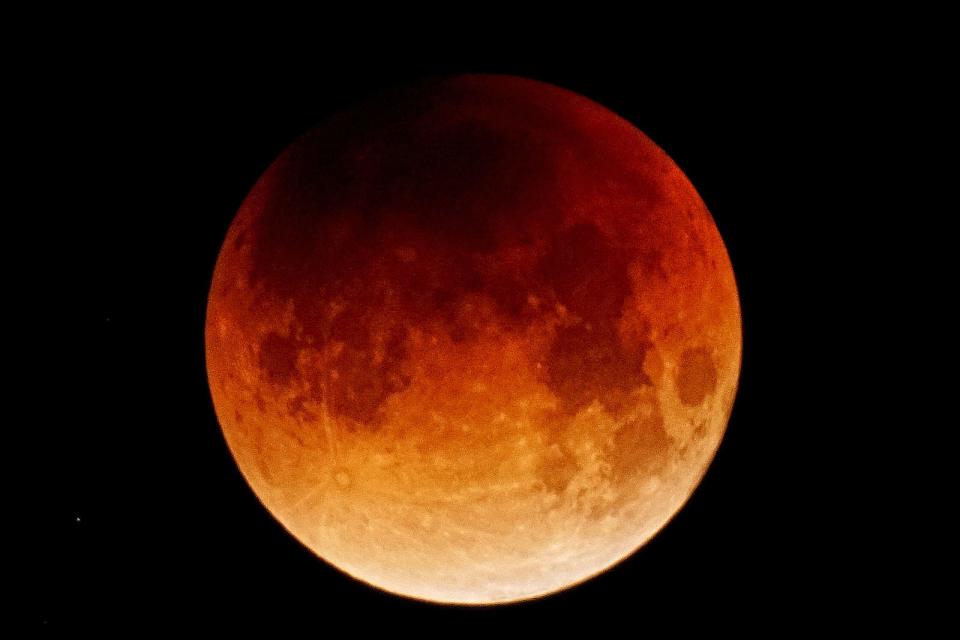 Tonight's total lunar eclipse will begin around 8:30 p.m. and end around 1:50 a.m. on Monday.