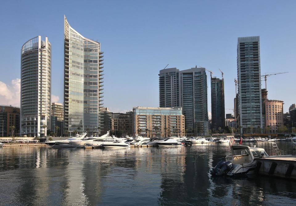 In this April 10, 2014 photo, luxury high-rise buildings line the seafront, in Beirut Lebanon. One by one, the old traditional houses of Beirut are vanishing as luxury towers sprout up on every corner, altering the city's skyline almost beyond recognition. While Lebanon's real estate sector has developed to become one of the country's success stories, many say it is coming at the expense of Lebanon's identity and heritage. (AP Photo/Hussein Malla)