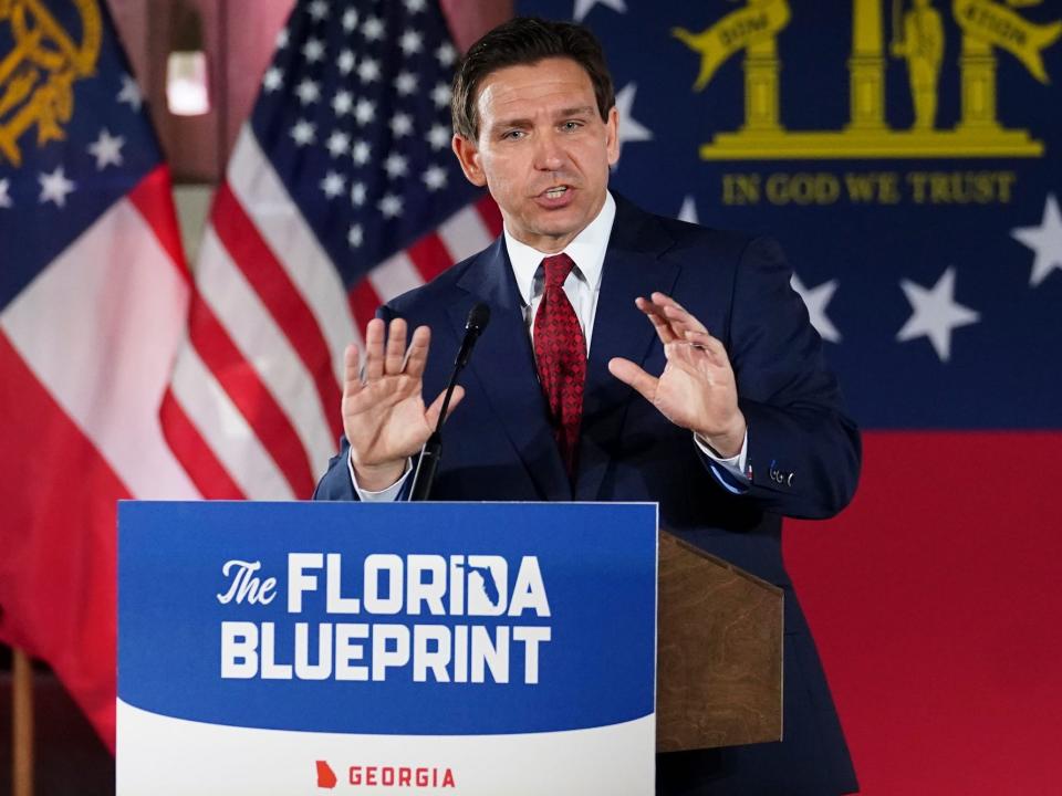 Florida Gov. Ron DeSantis speaks to a crowd at Adventure Outdoors gun store on March 30, 2023, in Smyrna, Georgia.