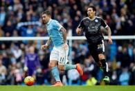 Football - Manchester City v Leicester City - Barclays Premier League - Etihad Stadium - 6/2/16 Manchester City's Aleksandar Kolarov in action with Leicester City's Leonardo Ulloa Reuters / Andrew Yates Livepic