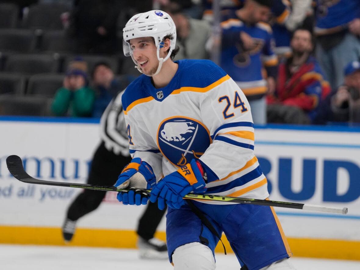 Buffalo Sabres' Dylan Cozens smiles after scoring an empty-net goal during the third period of an NHL hockey game against the St. Louis Blues Tuesday, Jan. 24 in St. Louis. The 'workhorse from Whitehorse' signed a contract extension Tuesday. (Jeff Roberson/AP - image credit)