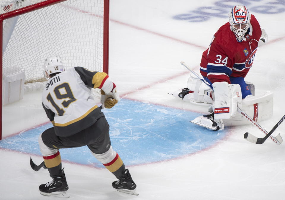 Montreal Canadiens goaltender Jake Allen gives up a goal to Vegas Golden Knights' Reilly Smith (19) during the second period of an NHL hockey game Saturday, Nov. 5, 2022, in Montreal. (Graham Hughes/The Canadian Press via AP)