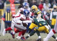 <p>New York Giants wide receiver Dwayne Harris (17) is tackled by Green Bay Packers cornerback Josh Hawkins (28) during the first quarter in the NFC Wild Card playoff football game at Lambeau Field. Mandatory Credit: Jeff Hanisch-USA TODAY Sports </p>