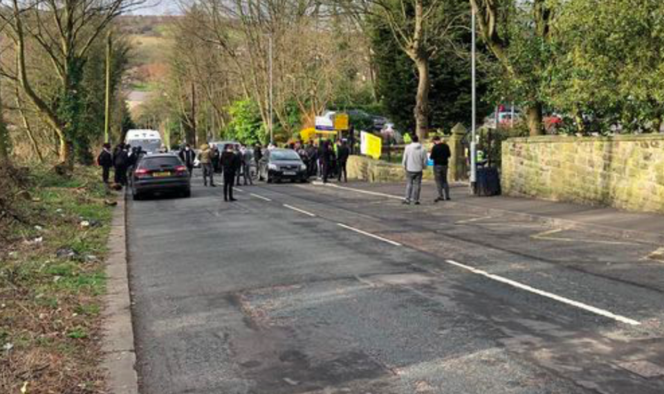 More than a hundred protesters, including dozens of students in uniform, gathered outside Batley Grammar to voice their concern. (Reach)