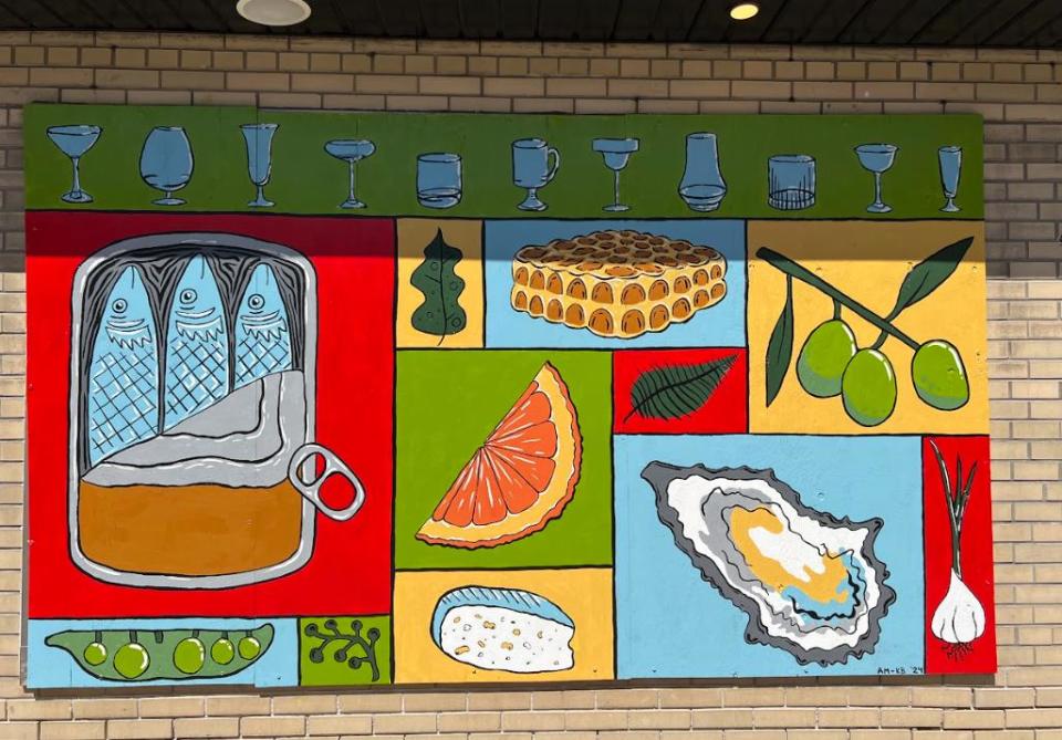 Close detail of the mural painted by Masse and Beecroft, showing items that feature on Maiden Lane's menu. 