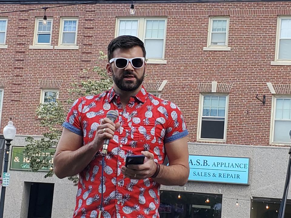 Dover City Councilor Robbie Hinkel speaks at Rochester Pride.