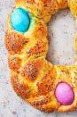 <p>Easter bread is an Italian and Greek tradition. It's a sweetened, yeasted dough with coloured eggs baked right into the dough (that you don't eat). We opted to make ours even more festive with sprinkles on top, but that's completely optional! </p><p>Get the <a href="https://www.delish.com/uk/cooking/recipes/a30775923/easter-bread-recipe/" rel="nofollow noopener" target="_blank" data-ylk="slk:Easter Bread;elm:context_link;itc:0" class="link ">Easter Bread</a> recipe.</p>