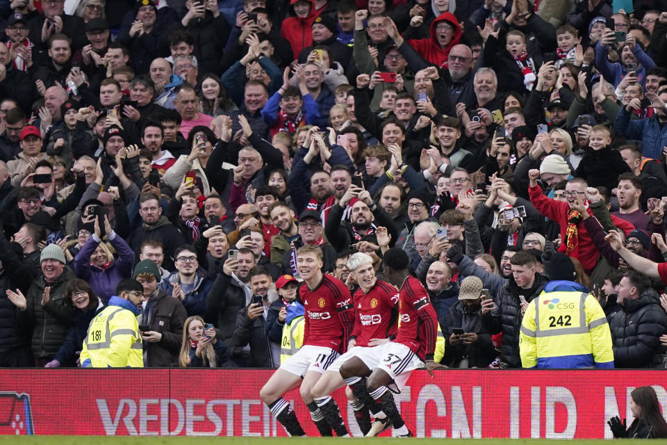 Manchester United's Alejandro Garnacho celebrates after scoring his side's second goal during the English Premier League soccer match between Manchester United and West Ham United at the Old Trafford stadium in Manchester, England, Sunday, Feb. 4, 2024. (AP Photo/Dave Thompson)