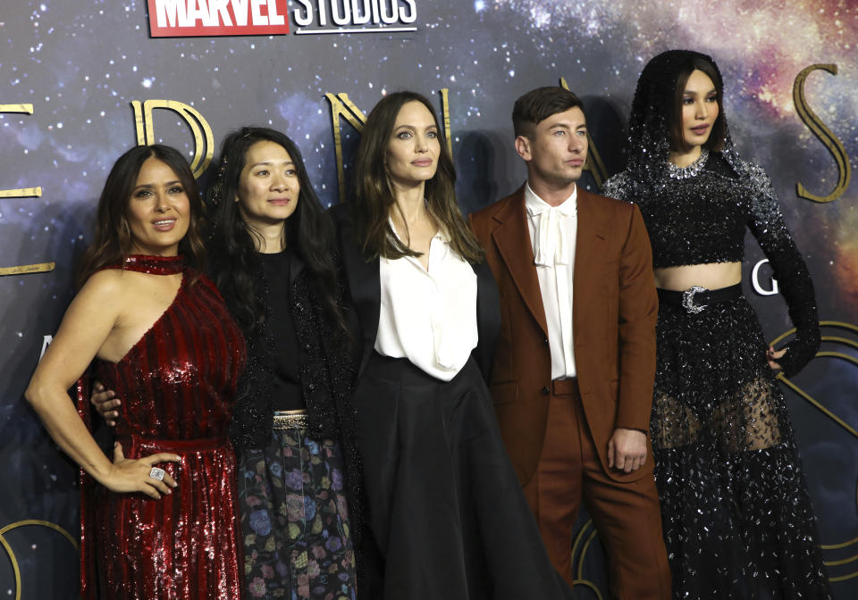 Salma Hayek, from left, director Chloe Zhao, Angelina Jolie, Barry Keoghan and Gemma Chan pose for photographers upon arrival at the premiere of the film 'Eternals' on Wednesday, Oct. 27, 2021 in London. (Photo by Vianney Le Caer/Invision/AP)