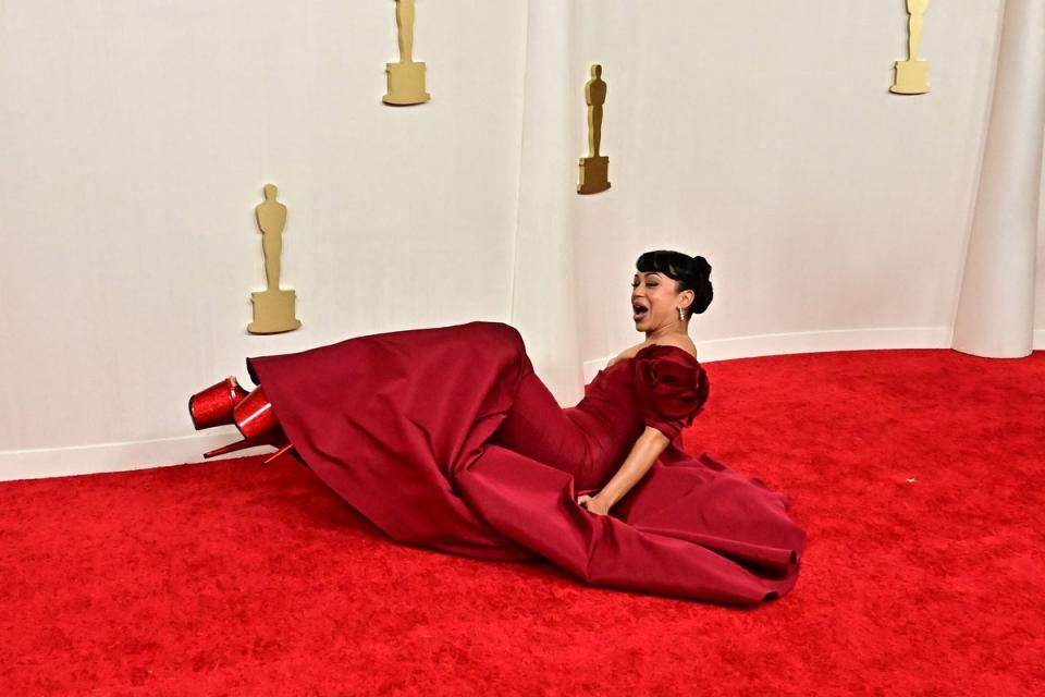 US actress Liza Koshy took a tumble on the red carpet (AFP via Getty Images)