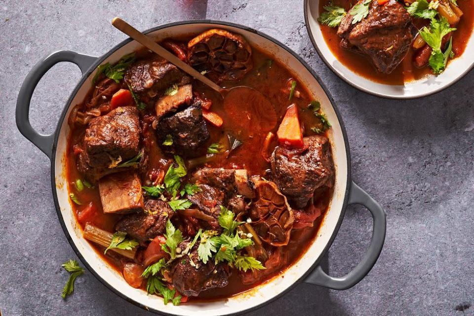 <p>Does anything impress quite the way braised short ribs do? They feel truly restaurant fancy, but here's a secret: Short ribs are pretty easy to make at home. This is the ideal dish to make for company when the weather's cold and you want to stay inside. We like it alongside creamy dishes like <a href="https://www.delish.com/cooking/recipe-ideas/a39024144/polenta-recipe/" rel="nofollow noopener" target="_blank" data-ylk="slk:polenta" class="link ">polenta</a> or <a href="https://www.delish.com/cooking/recipe-ideas/recipes/a50630/perfect-mashed-potatoes-recipe/" rel="nofollow noopener" target="_blank" data-ylk="slk:mashed potatoes" class="link ">mashed potatoes</a>, or paired with a flavor-forward salad, like our <a href="https://www.delish.com/cooking/recipe-ideas/a38984280/fennel-salad-recipe/" rel="nofollow noopener" target="_blank" data-ylk="slk:fennel" class="link ">fennel</a> or <a href="https://www.delish.com/cooking/recipe-ideas/a20155300/roasted-beet-goat-cheese-salad-recipe/" rel="nofollow noopener" target="_blank" data-ylk="slk:beet salads" class="link ">beet salads</a>.<br><br>Get the <strong><a href="https://www.delish.com/cooking/recipe-ideas/a39561720/how-to-make-braised-short-ribs/" rel="nofollow noopener" target="_blank" data-ylk="slk:Braised Short Ribs with 40 Cloves of Garlic recipe" class="link ">Braised Short Ribs with 40 Cloves of Garlic recipe</a></strong>. </p>