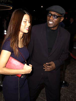 Wesley Snipes and gal at the Westwood premiere of MGM's Bandits