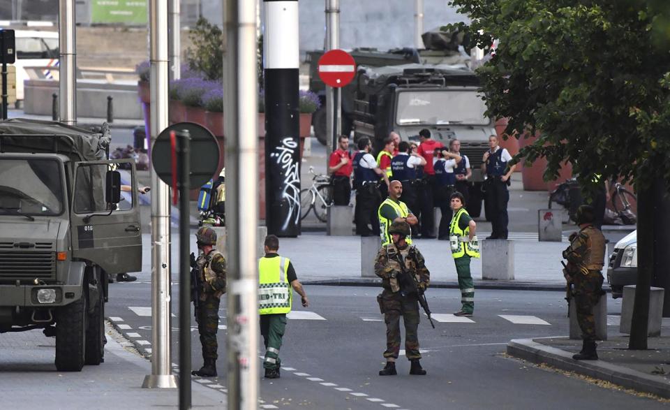 <p>Belgian Army soldiers and police patrol outside Central Station after a reported explosion in Brussels on Tuesday, June 20, 2017. Belgian media are reporting that explosion-like noises have been heard at a Brussels train station, prompting the evacuation of a main square. (AP Photo/Geert Vanden Wijngaert) </p>