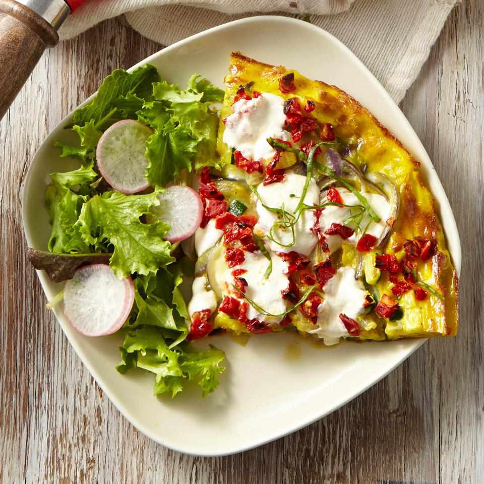 <p>This vegetable-studded frittata recipe is one of the quickest meals you can make. Make it for breakfast, or serve for lunch or dinner with a tossed salad and a slice of olive oil-drizzled crusty baguette. <a href="https://www.eatingwell.com/recipe/251004/mozzarella-basil-zucchini-frittata/" rel="nofollow noopener" target="_blank" data-ylk="slk:View Recipe;elm:context_link;itc:0;sec:content-canvas" class="link ">View Recipe</a></p>