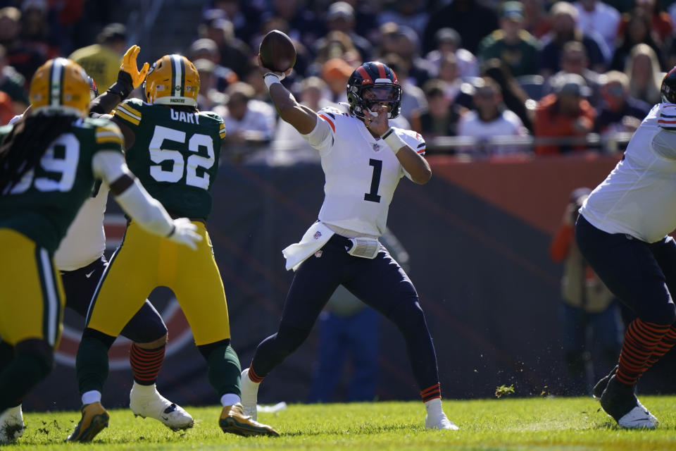 Chicago Bears quarterback Justin Fields passes during the first half of an NFL football game against the Green Bay Packers Sunday, Oct. 17, 2021, in Chicago. (AP Photo/Nam Y. Huh)