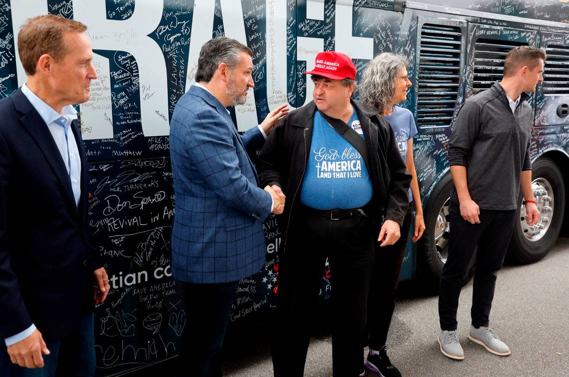 Kevin and Elaine Ross of Raleigh greet Texas Sen. Ted Cruz, center, Republican U.S. Senate candidate Ted Budd, left, and Bo Hines, Republican running for the 13th Congressional District, right, after a rally in Selma, N.C., Tuesday, Oct. 25, 2022.