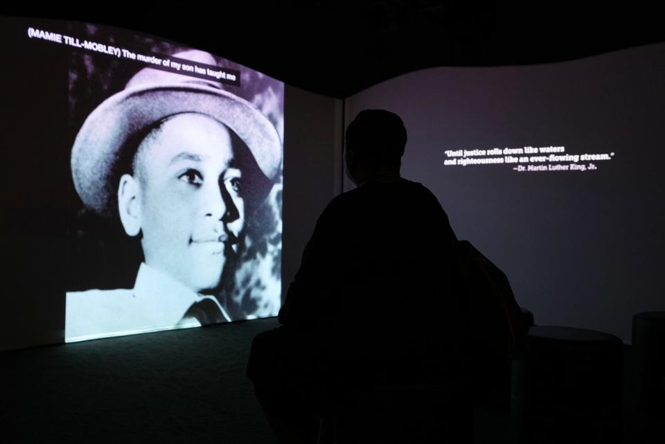 A new traveling exhibit titled "Emmett Till and Mamie Till-Mobley: Let the World See" tells the story of Emmett Till and his mother in the context of the larger Civil Rights Movement, seen during an exhibit preview on Wednesday, Sept. 14, 2022, at The Children's Museum of Indianapolis. In 1955, Emmett, who was Black, was visiting family in Mississippi when he was kidnapped, beaten and killed by white men who accused the 14-year-old of whistling at a white woman. They dumped his body in the Tallahatchie River. Till's mother held an open casket funeral and said, "let the world see what they did to my boy."