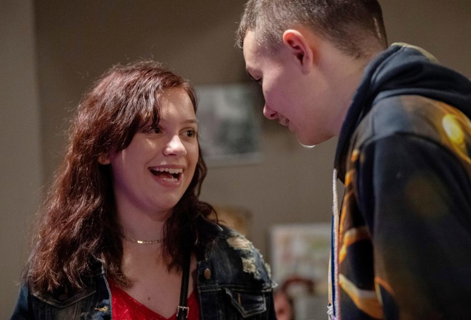 Kloe Hill, 15, and Tre Schapker hang out at Froggy's Restaurant in Wadesville, Ind., during Schapker's 14th birthday party Friday night, Jan. 20, 2023. The two are great friends and have both spent more than their fair share of time at Riley's Children's Hospital in Indianapolis.