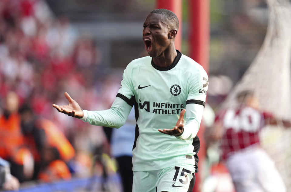 Chelsea's Nicolas Jackson celebrates scoring his side's third goal during the English Premier League soccer match between Nottingham Forest and FC Chelsea in Nottingham, England, Saturday, May 11, 2024. (Mike Egerton/PA via AP)