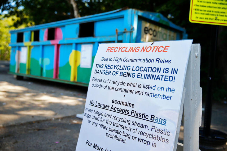 A sign posted by Ecomaine in Yarmouth warns residents that the program could be eliminated. | Ben McCanna/Portland Portland Press Herald via Getty Images