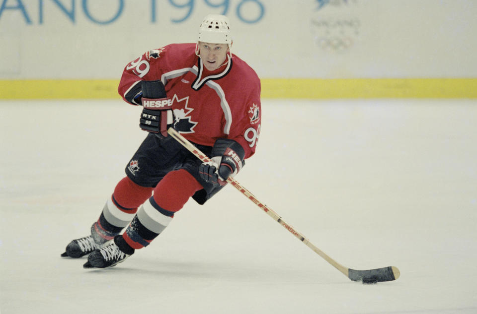 Wayne Gretsky #99 of Canada controls the puck during the Group D game against the United States in the Men's Ice Hockey tournament on 16 February 1998 during the XVIII Olympic Winter Games at the The Big Hat Arena, Nagano, Japan. (Photo by Elsa Hasch/Allsport/Getty Images) 