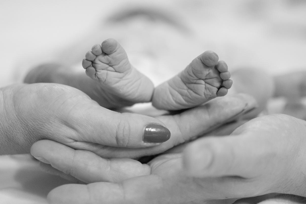 A couple have shared pictures of their stillborn daughter to raise awareness about the needs of parents who lose their babies [Photo: Remember My Baby / SWNS.com]