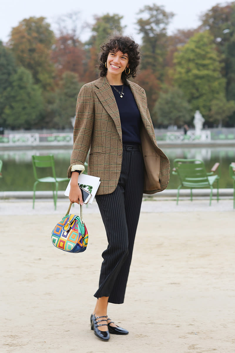 <p>Pattern play feels fresh via plaid and pinstripes in neutral tones. A rainbow-colored bag brings the fun.</p> <h4>Getty Images</h4>