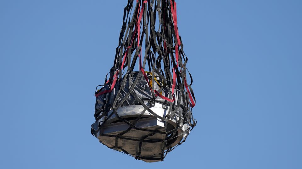 A helicopter delivered the capsule containing the sample to a temporary clean room. - Rick Bowmer/AP