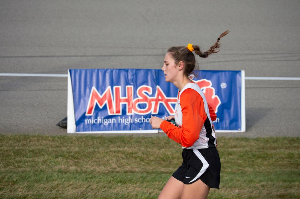 Senior Comet Madison Magda finishes the final stretch of the race at the D3 State Finals.