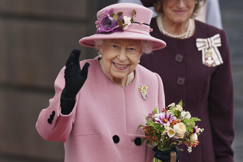 Britain's Queen Elizabeth II leaves after the opening ceremony of the sixth session of the Senedd in Cardiff, Wales, Thursday Oct. 14, 2021. (Jacob King/PA via AP)