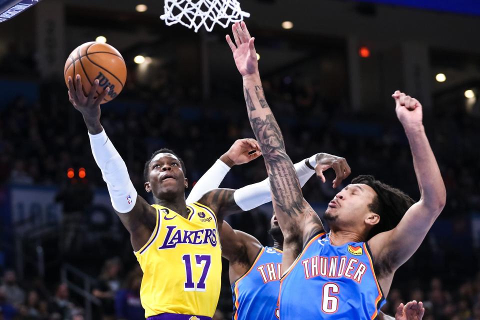 Los Angeles guard Dennis Schroder (17) jumps to shoot for two in the first quarter of an NBA game between the Oklahoma City Thunder and the Los Angeles Lakers at the Paycom Center in Oklahoma City on Wednesday, March 1, 2023. 