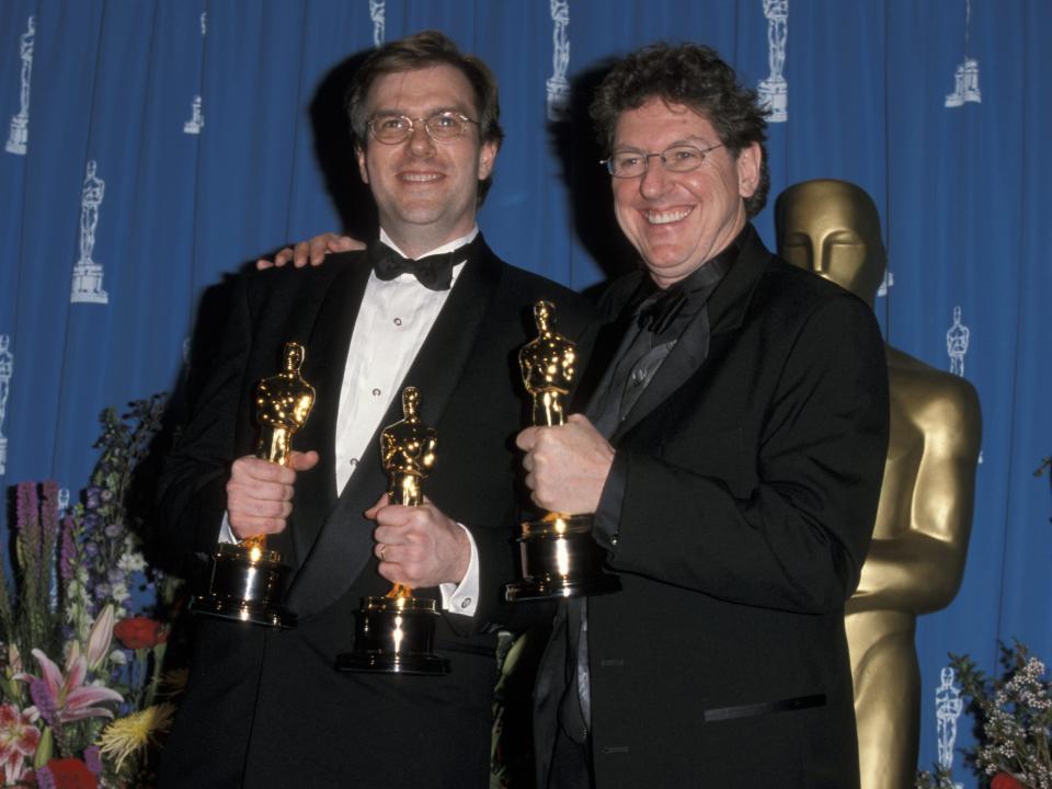 Gary Rydstrom (L) and Richard Hymns (R) pose with their Academy Awards in 1999.