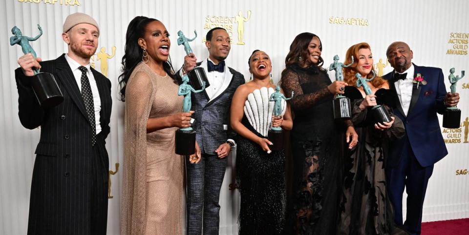 The cast of ‘Abbott Elementary' with their awards (AFP via Getty Images)