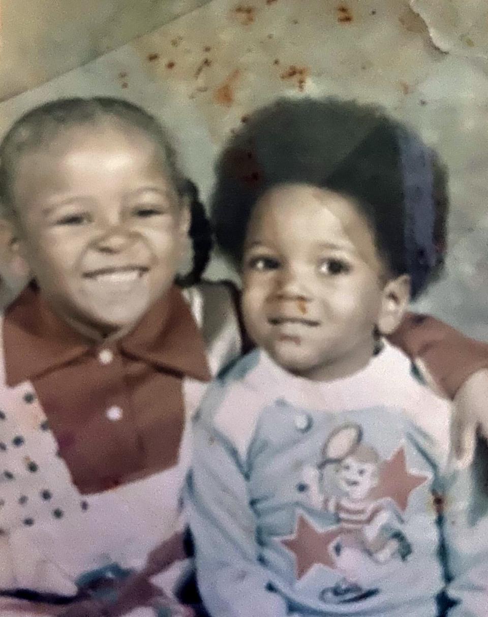 In this undated photo, big sis Romonia Butler Foster, who was 4 years old at the time, is shown with her baby brother Ronald Butler, who was 3.