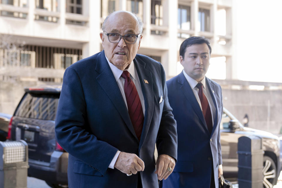 Former Mayor of New York Rudy Giuliani arrives at the federal courthouse in Washington, Monday, Dec. 11, 2023. The trial will determine how much Giuliani will have to pay two Georgia election workers who he falsely accused of fraud while pushing President Donald Trump's baseless claims after he lost the 2020 election. (AP Photo/Jose Luis Magana)