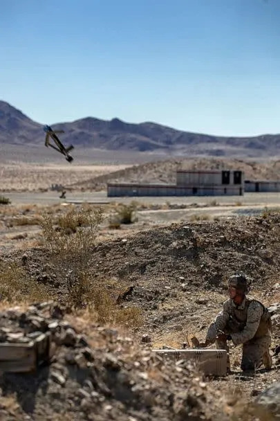 PHOTO: U.S. Marine Corps Cpl. Graham Rouse launches the Switchblade 300 1-20 on Marine Corps Air Ground Combat Center, Twentynine Palms, Calif., Oct. 23, 2019. (U.S. Marine Corps)