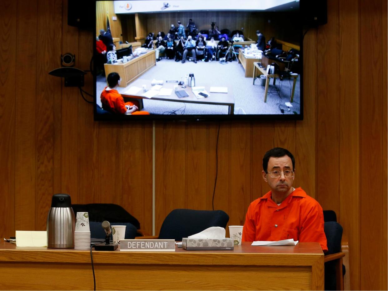 Former Michigan State University and USA Gymnastics doctor Larry Nassar listens during the sentencing phase in Eaton, County Circuit Court on 31 January 2018: JEFF KOWALSKY/AFP/Getty Images