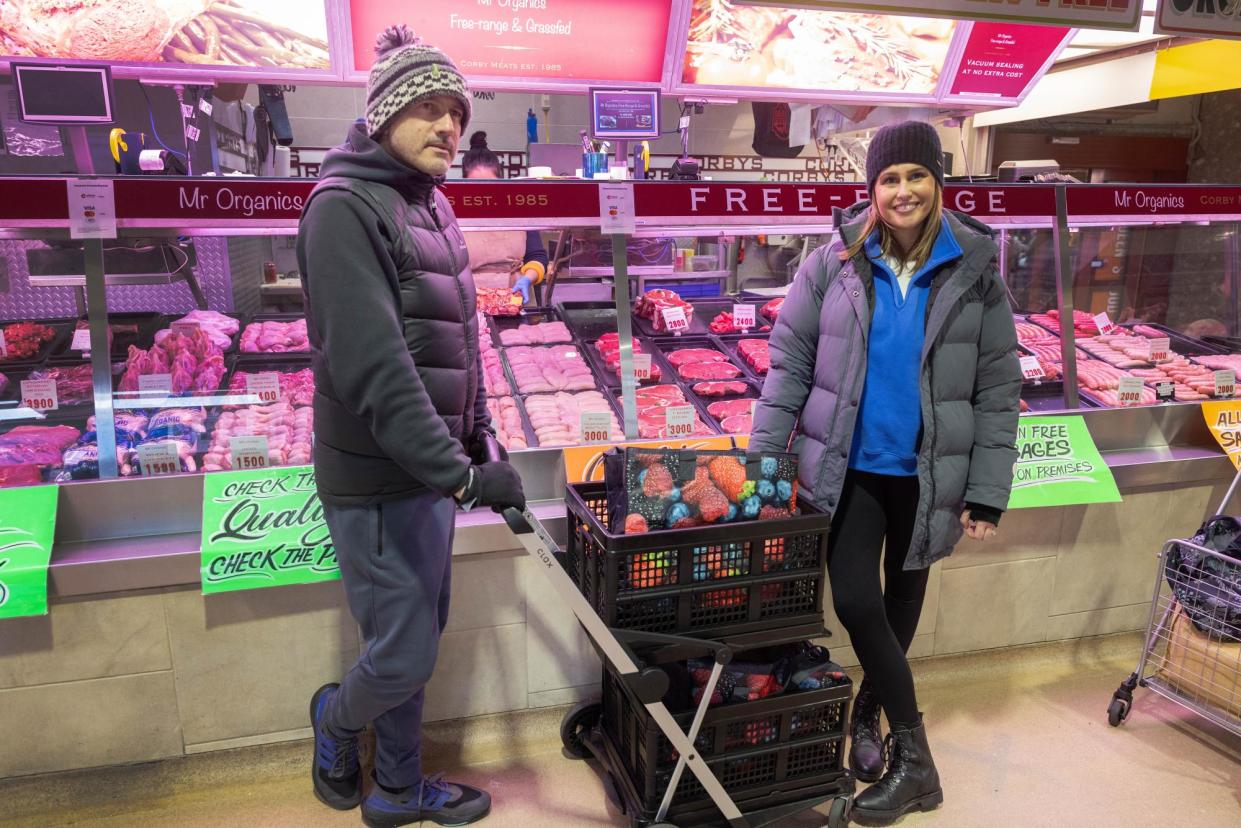 <span>‘Coles and Woolworths don’t have this meat,’ says David, shopping at the Queen Victoria Market with Jessica.</span><span>Photograph: Ellen Smith/The Guardian</span>