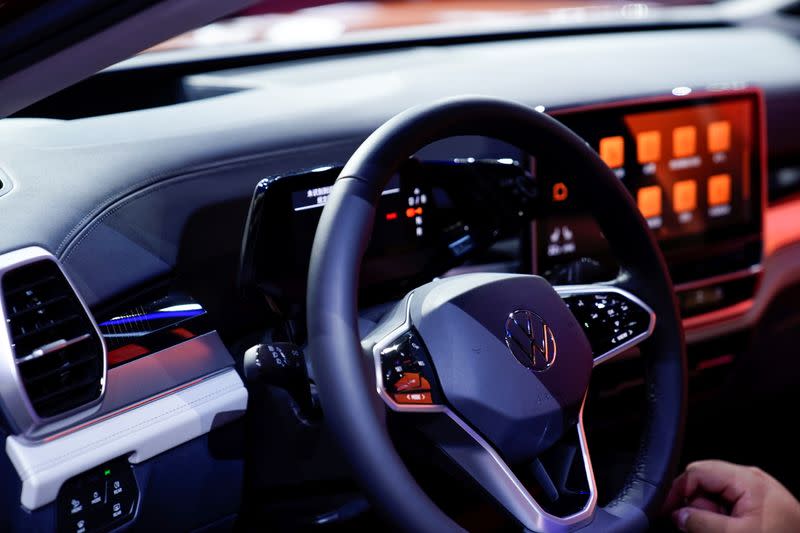 A Volkswagen logo is seen on a steering wheel as it launches its ID.6 and ID.6 CROZZ SUV at a world premiere ahead of the Shanghai Auto Show