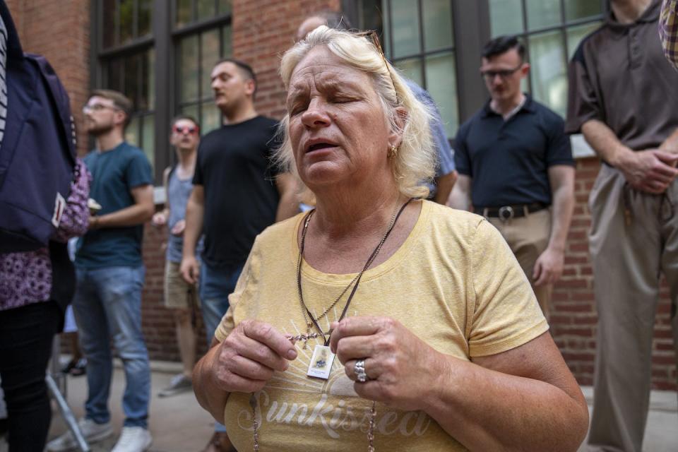 Anti-abortion activists pray in New York in August 2022 outside a Planned Parenthood clinic. <a href="https://www.gettyimages.com/detail/news-photo/anti-abortion-activists-pray-in-front-of-the-planned-news-photo/1413322749?adppopup=true" rel="nofollow noopener" target="_blank" data-ylk="slk:Robert Nickelsberg/Getty Images;elm:context_link;itc:0;sec:content-canvas" class="link ">Robert Nickelsberg/Getty Images</a>
