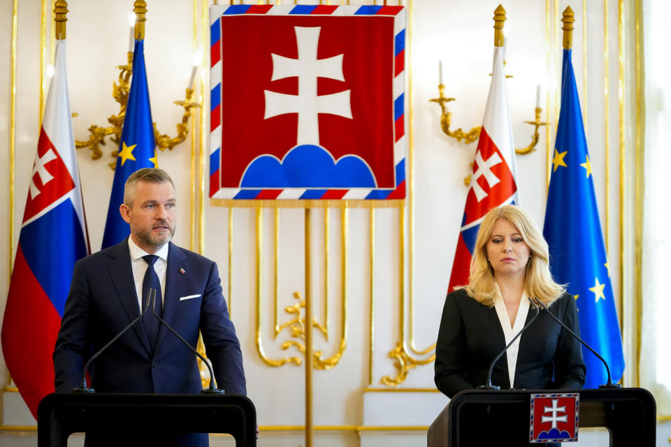 Slovakia's incumbent President Zuzana Caputova, right, and President elect Peter Pellegrini hold a joint press conference at the presidential palace in Bratislava, Slovakia, Thursday, May 16, 2024. Slovak Prime Minister Robert Fico was in serious but stable condition Thursday, a hospital official said, after the populist leader was shot multiple times in an assassination attempt that shook the small country and reverberated across the continent weeks before European elections.(AP Photo/Petr David Josek)