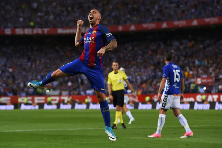 Barcelona's Paco Alcacer celebrates scoring against Deportivo Alaves during the Spanish Copa del Rey final at the Vicente Calderon stadium in Madrid on May 27, 2017